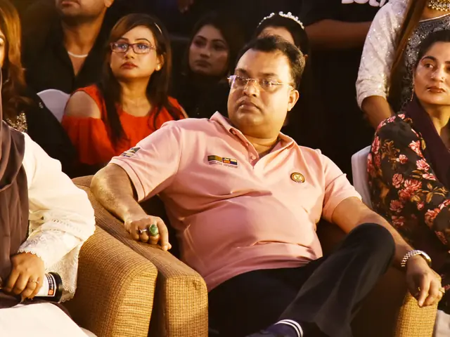 Abdul Kader Chowdhury attending a cultural event