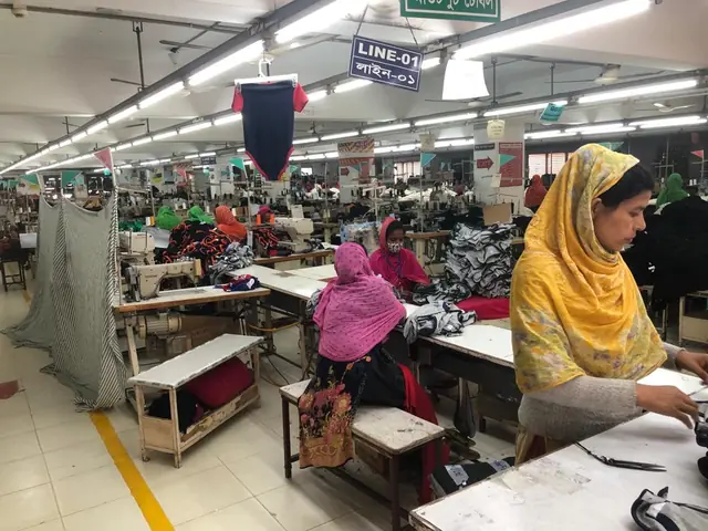 Workers on a garments production line
