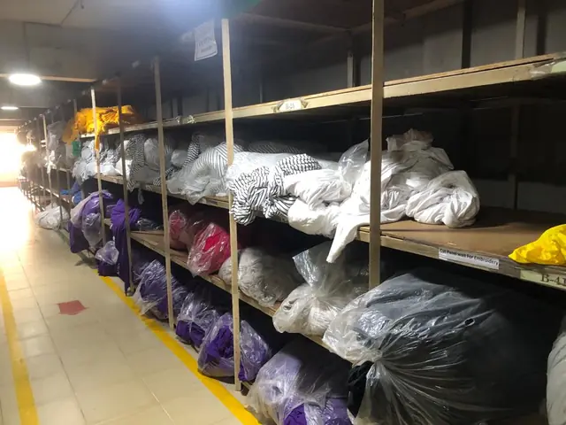 Garments store with stocked shelves