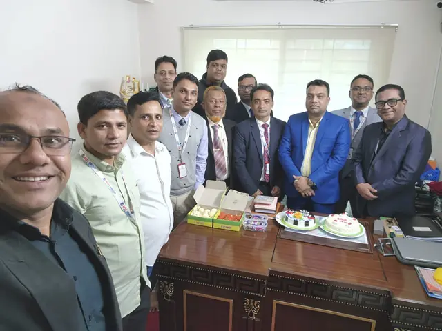 Dana Group team members celebrating at the office